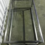 Table basse en acier et laiton