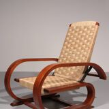 An exceptionally rare mahogany recliner crafted in Italy during the 1950s"