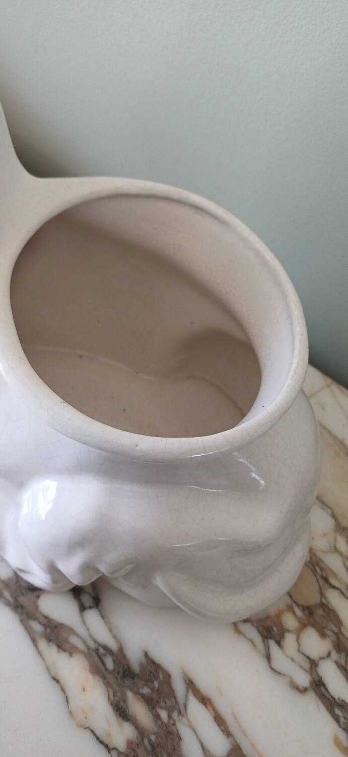 Cracked glazed faience in a zoomorphic design