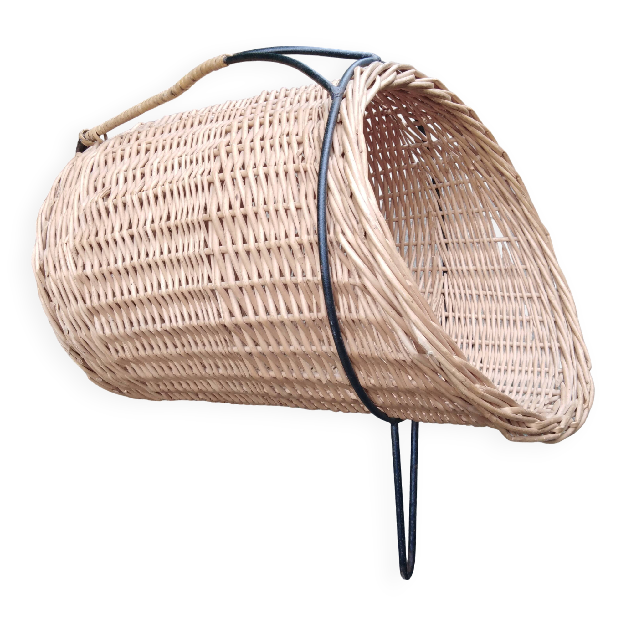 scandinavian  midcentury magazine holder in wicker and with metall legs