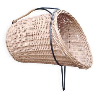 scandinavian  midcentury magazine holder in wicker and with metall legs