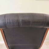 Black leather rocking Chesterfield armchair