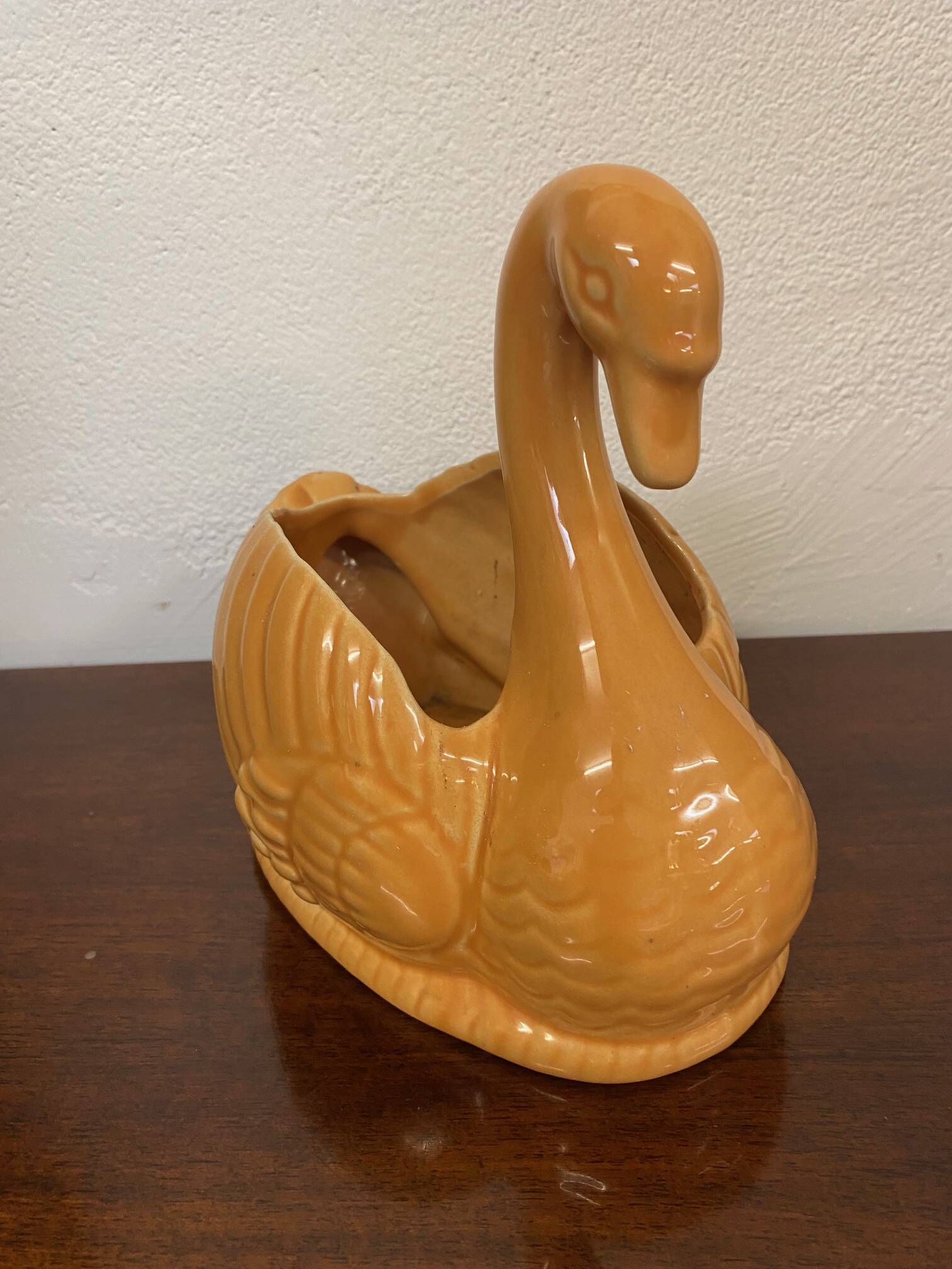 Swan shaped planter in 70s earthenware apricot orange color
