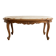 Oval coffee table in Louis XV style made of onyx and solid wood.