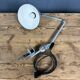 Light grey Rademacher clamp lamp with large enamel shade