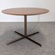 Contemporary round side table or end table.