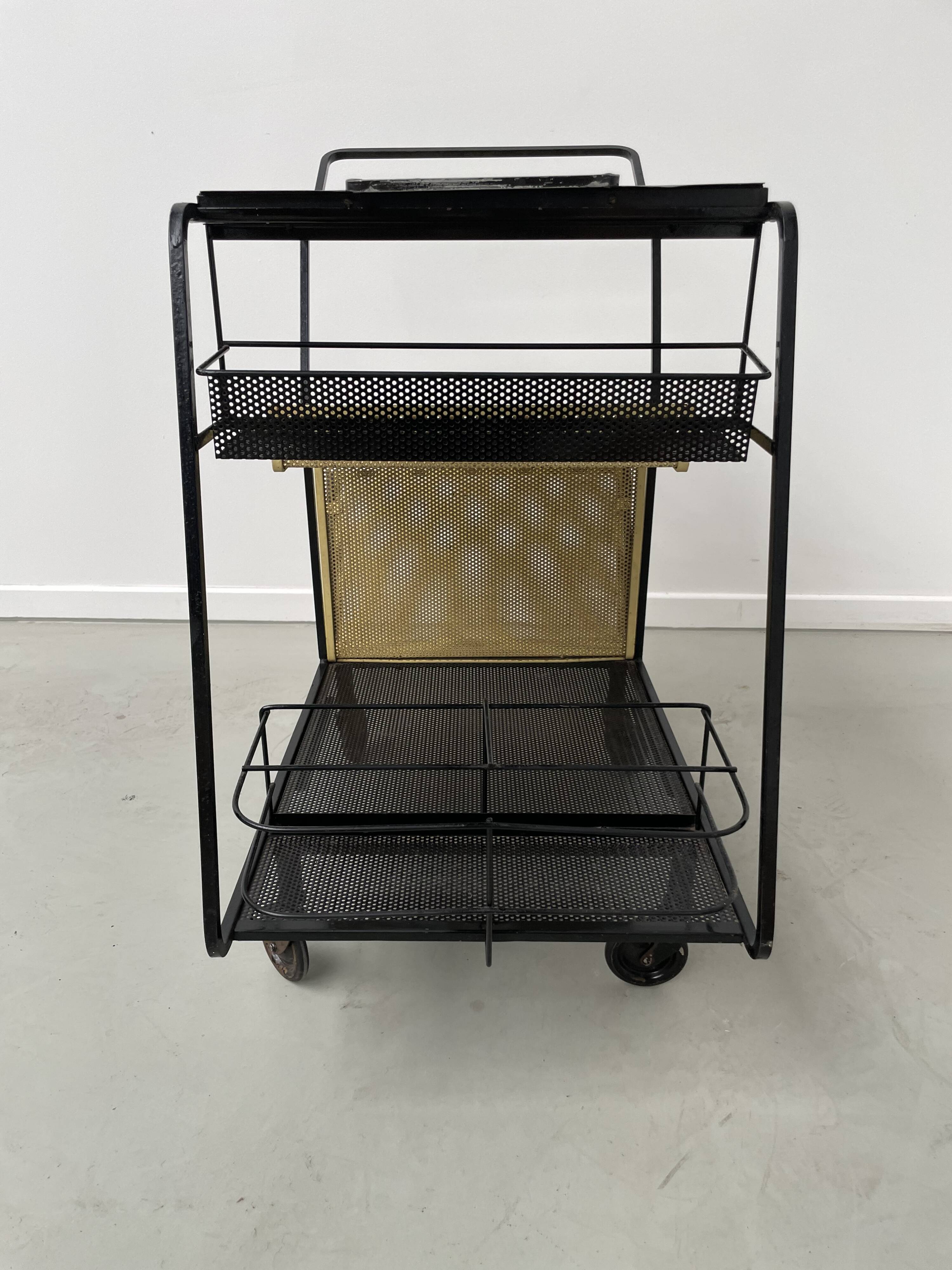 Perforated metal serving trolley in the Mathieu Matégot style