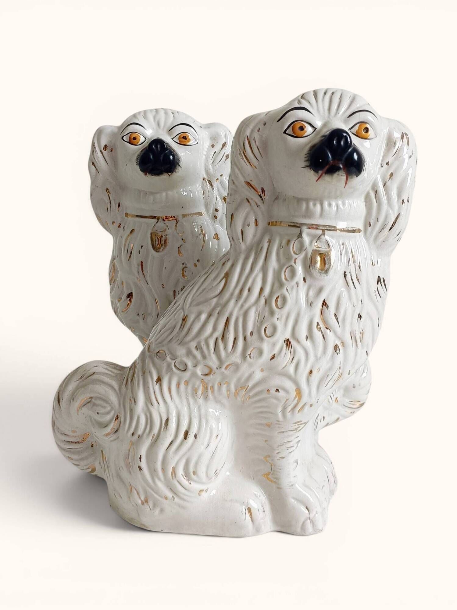 Pair of King Charles Spaniel dogs in Staffordshire majolica style.