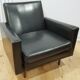 Fauteuil en skaï noir, années 1960