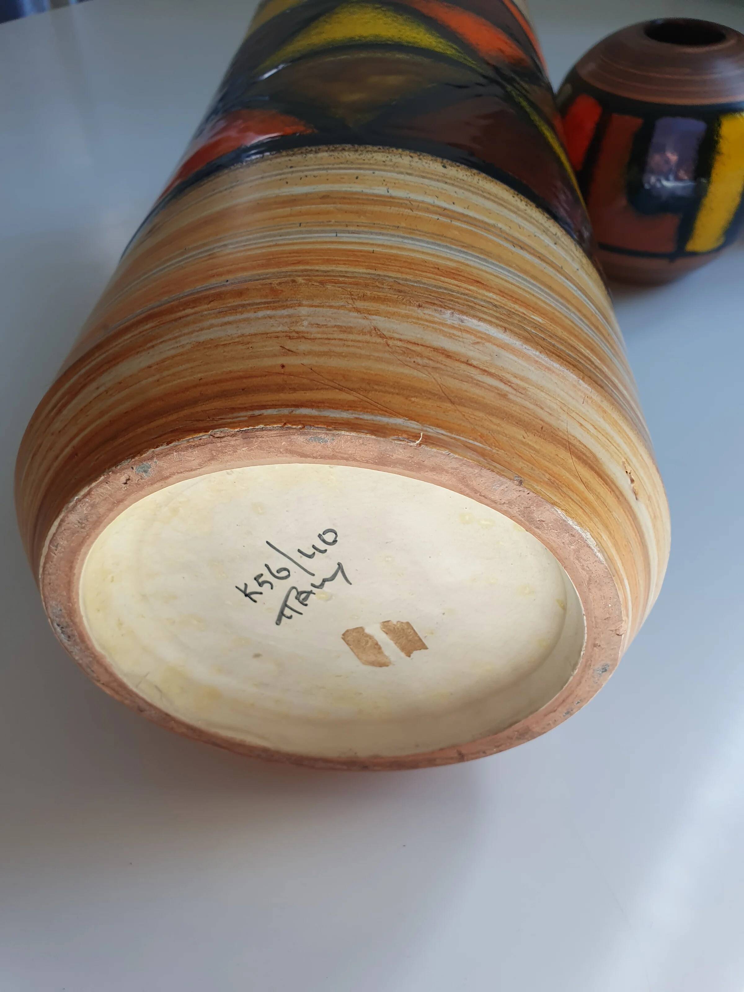 Mid-century pattern Vetrata vases and bowls by Aldo Londi for Bitossi Italy. Black, blue, orange and yellow on a brushed background.