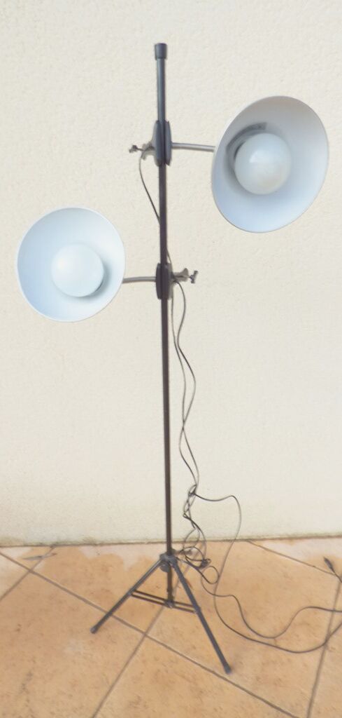 Industrial-style floor lamp with two large adjustable removable spotlights