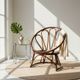 Fauteuil corbeille vintage en rotin à dossier soleil – Style Riviera, année