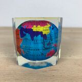 Globe paper press under resin