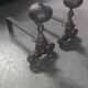 Paire de chenets en bronze et acier XIX Hollande