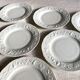 Série de 6 assiettes à dessert en porcelaine de Limoges