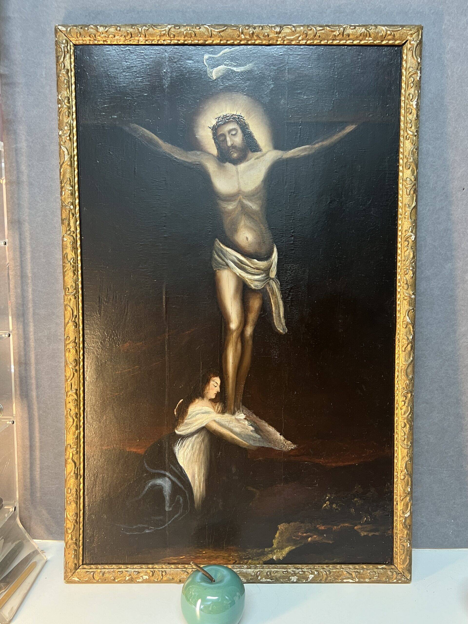 Beautiful religious work from the 17th century, oil on panel representing Christ on his cross with Mary Magdalene at his feet
