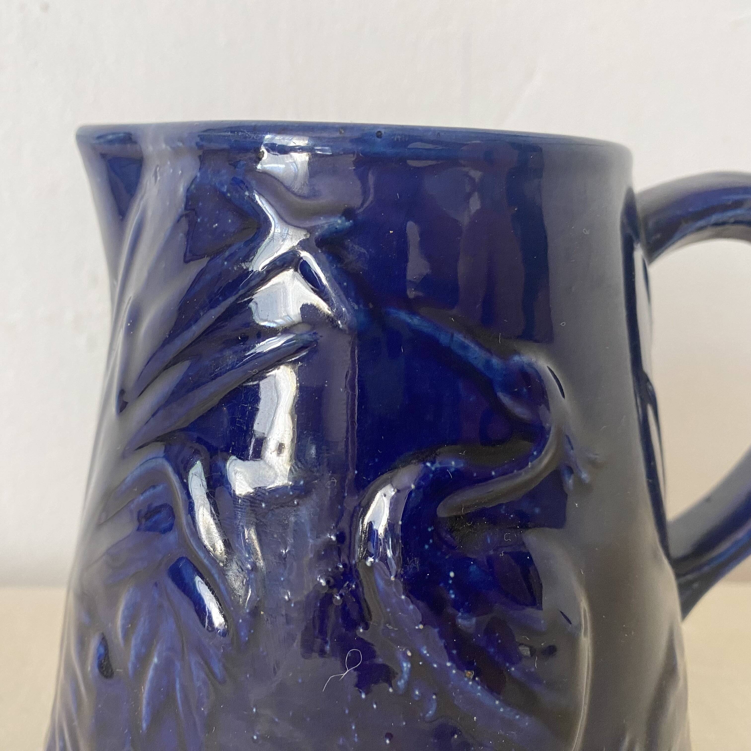 Heron slip jug made in England