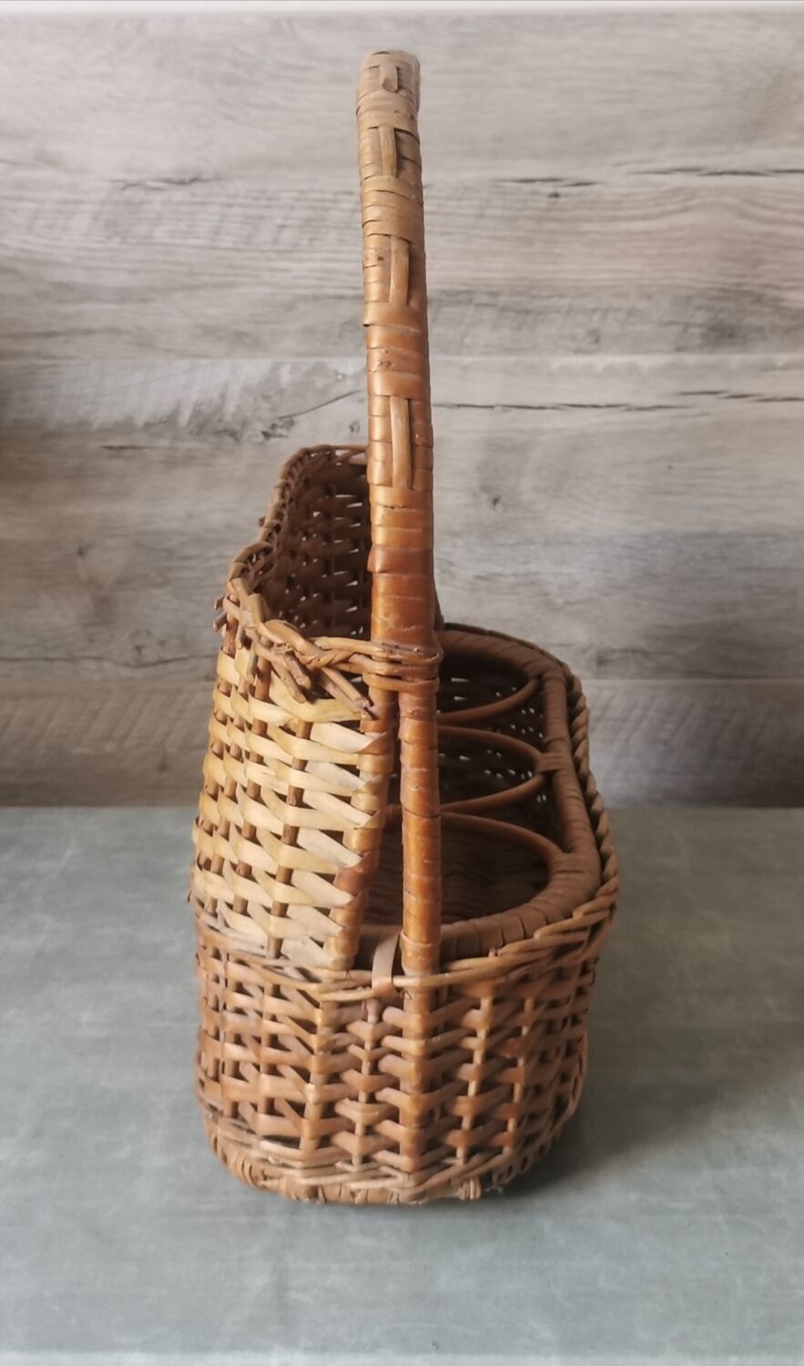 Vintage wicker bottle rack