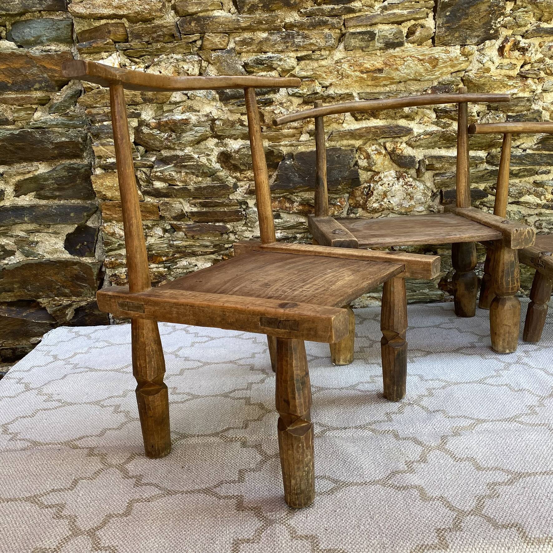 Ancient Baoulé African chairs in carved wood, Wabi-Sabi.
