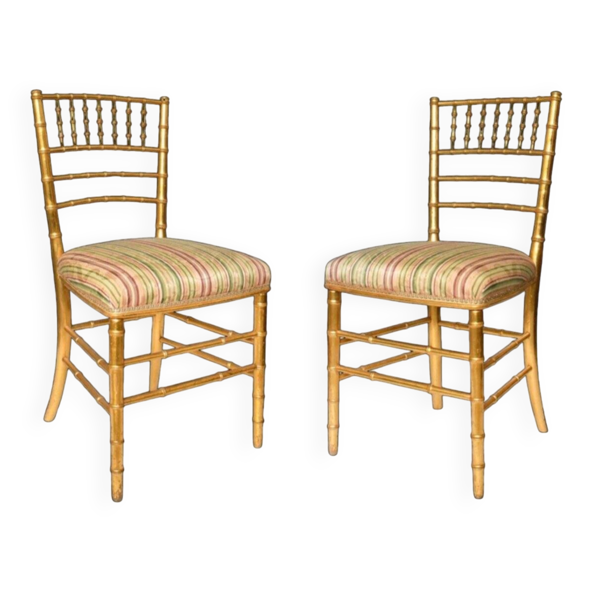 Pair of golden wood chairs in a bamboo style.