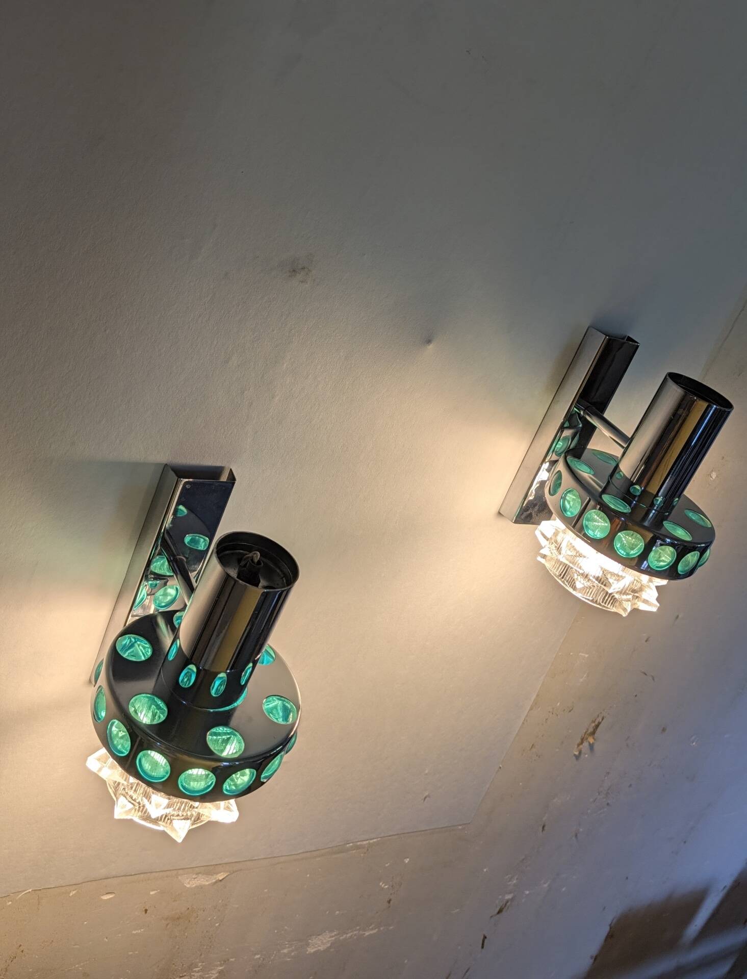 Pair of Space Age wall lights in chrome and green glass, 1970s.