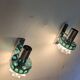 Pair of Space Age wall lights in chrome and green glass, 1970s.