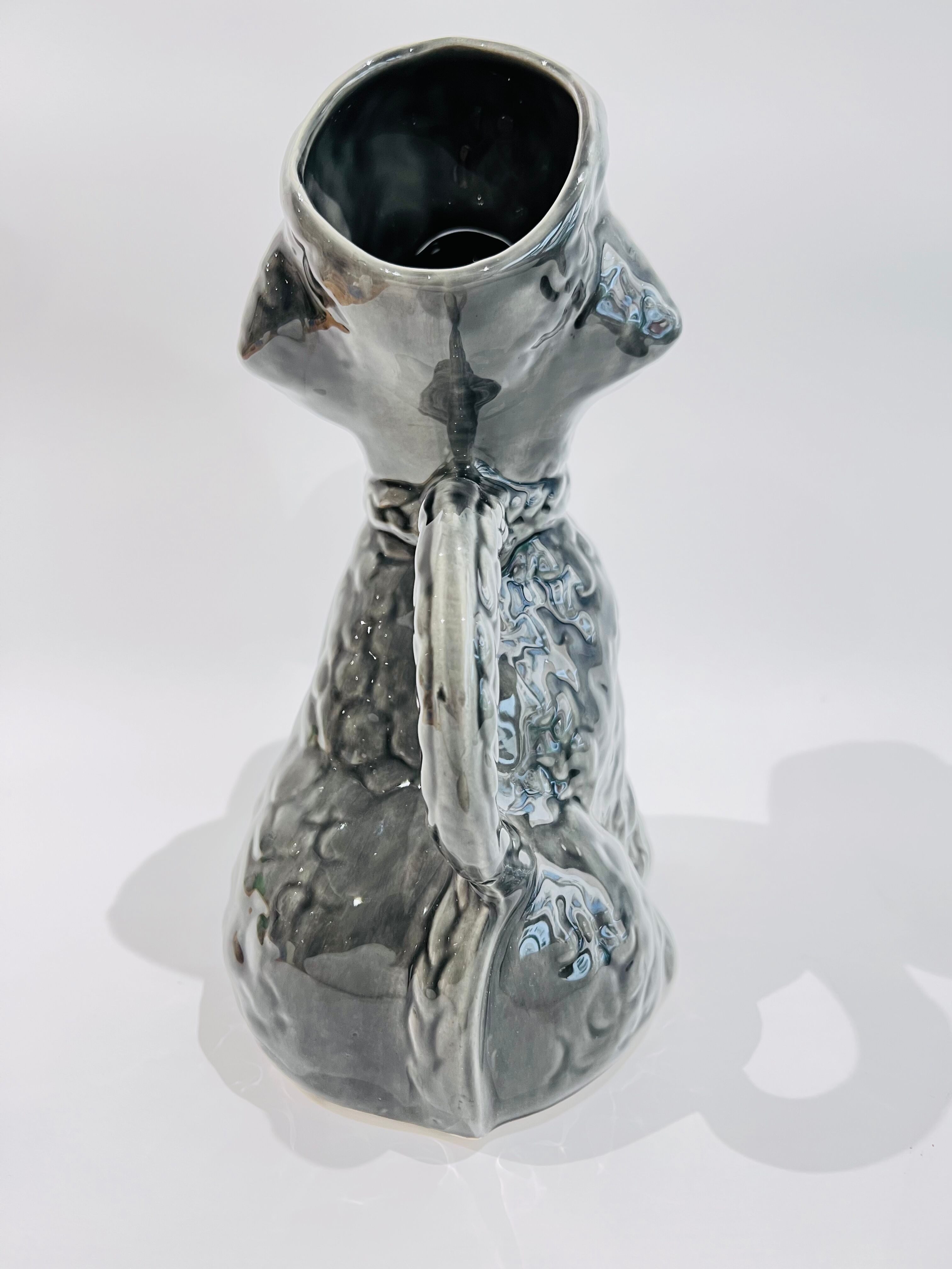 Pitcher in grey poodle slip