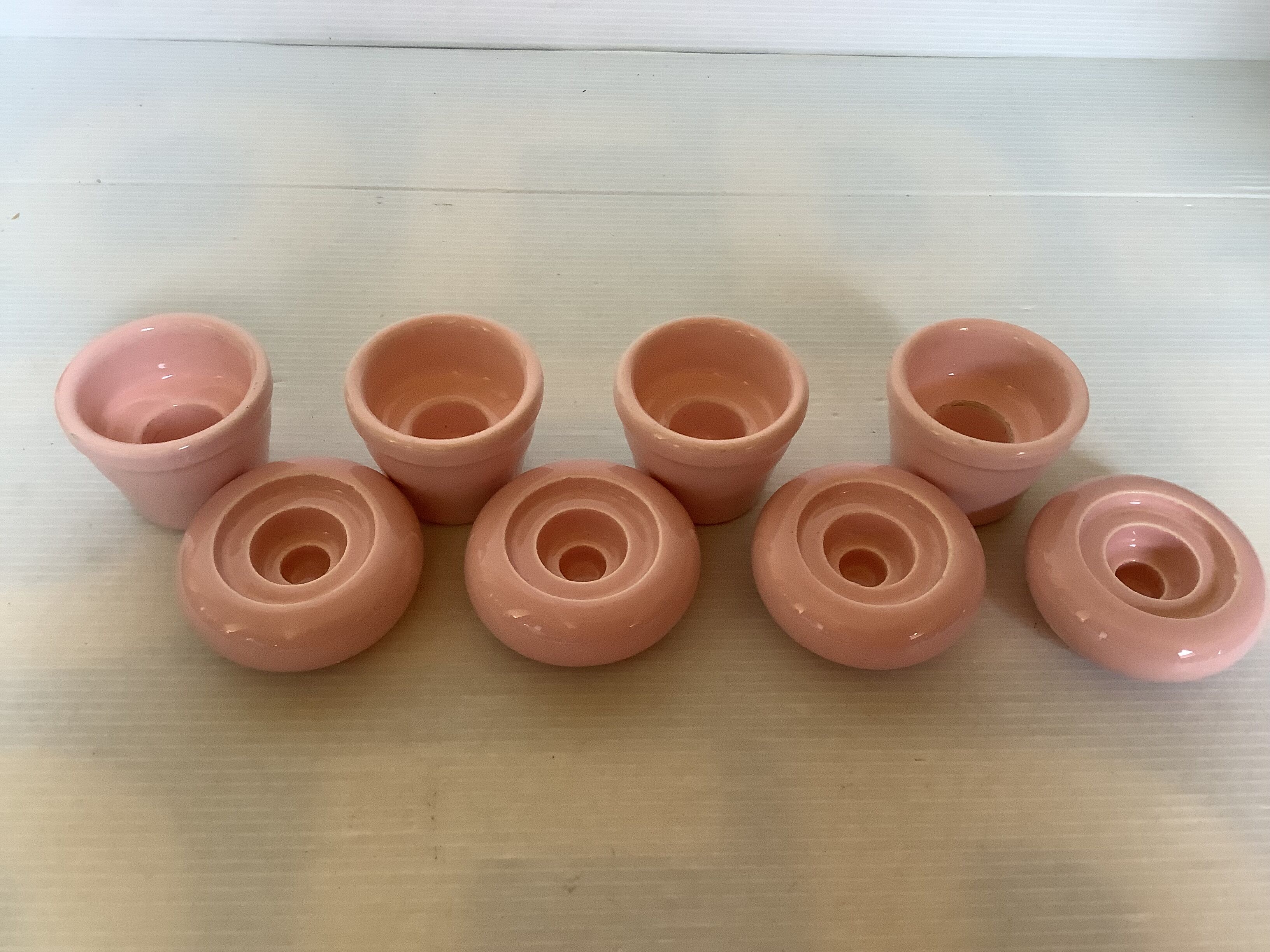 Four double pink candlesticks