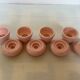 Four double pink candlesticks
