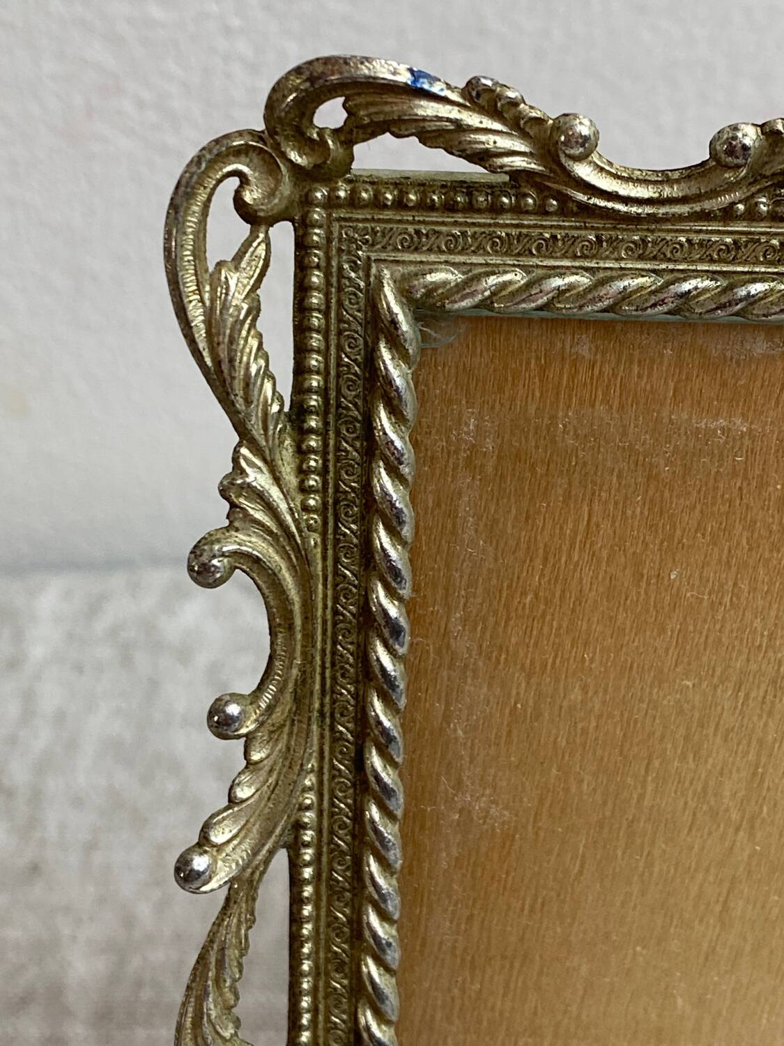 Italian gold metal frame on stand