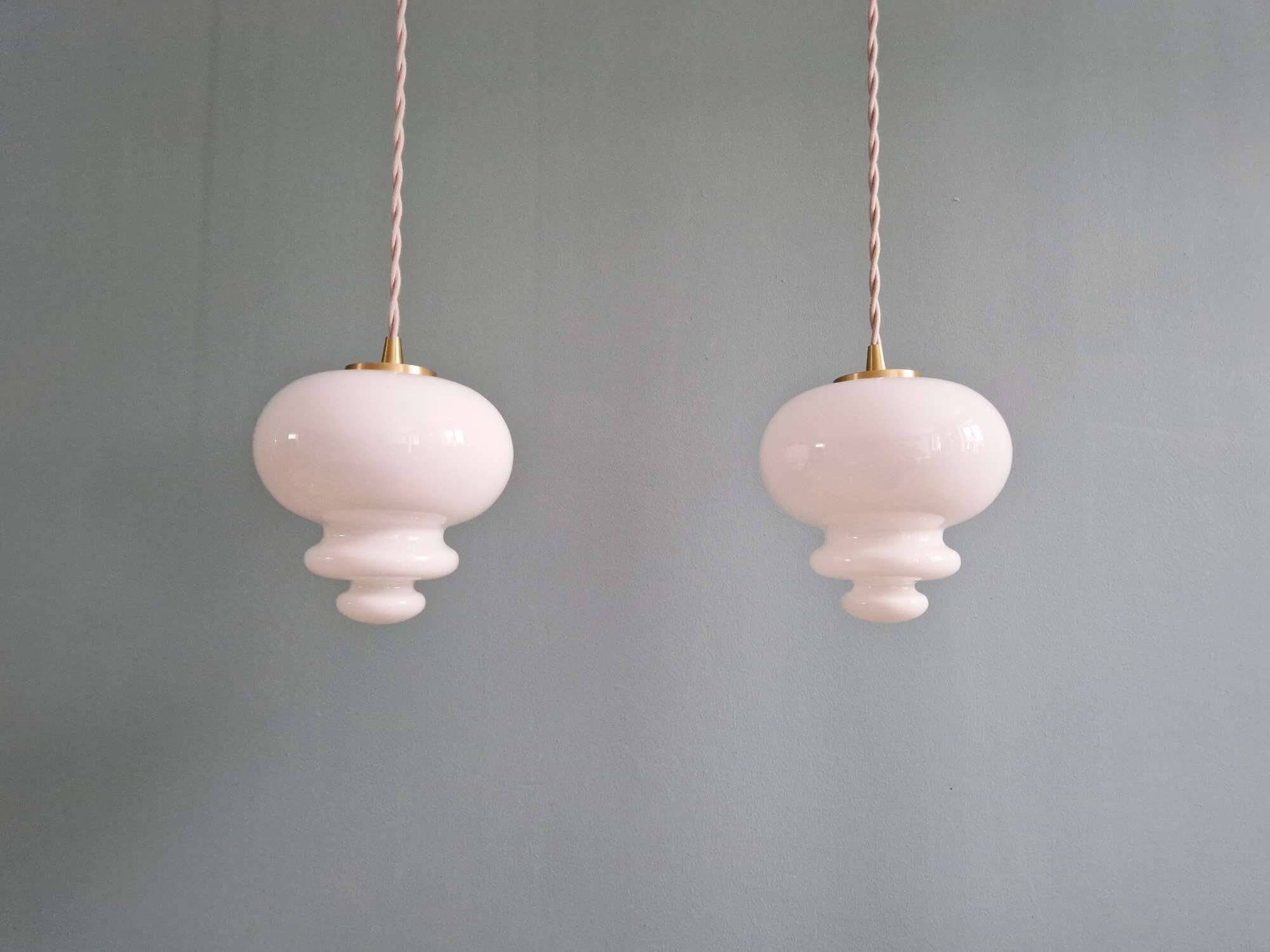 Scandinavian trio of suspensions in white opaline, 1960s