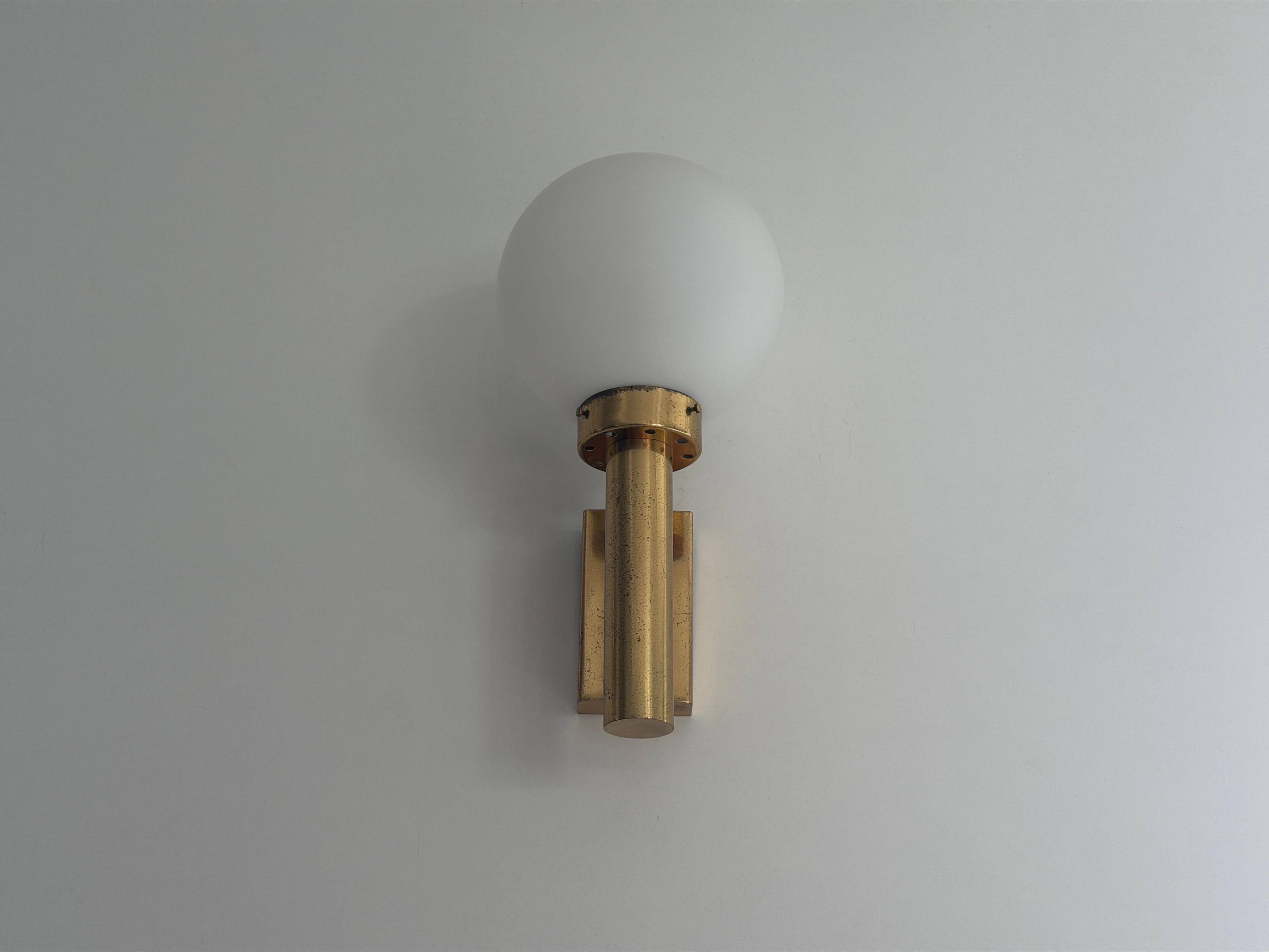 Large minimalist cinema wall light in opal glass and heavy brass, 1960s, Germany