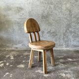 Small child's chair in natural blond teak back with three bars