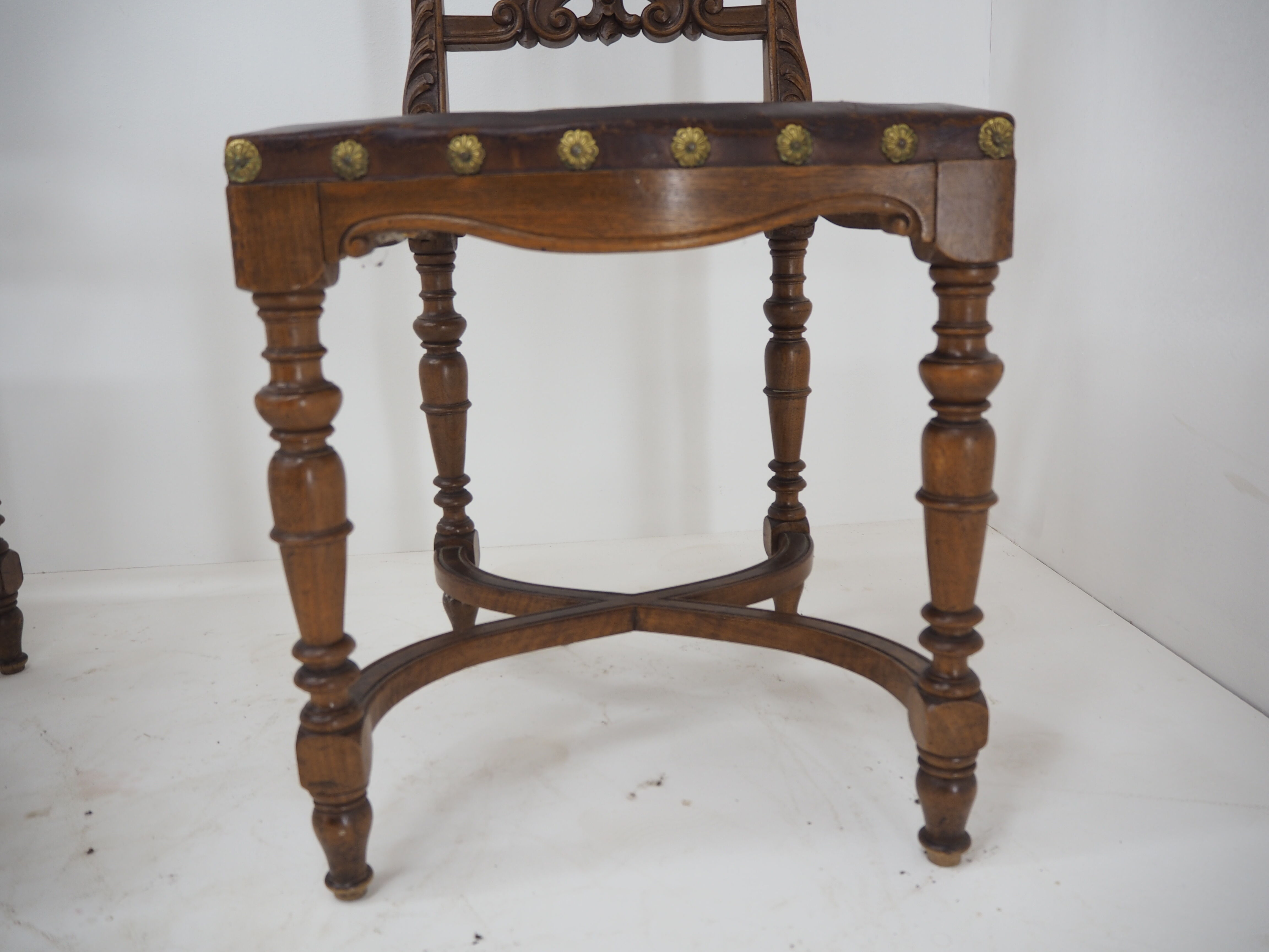 Pair of Antique Embossed Leather Chairs