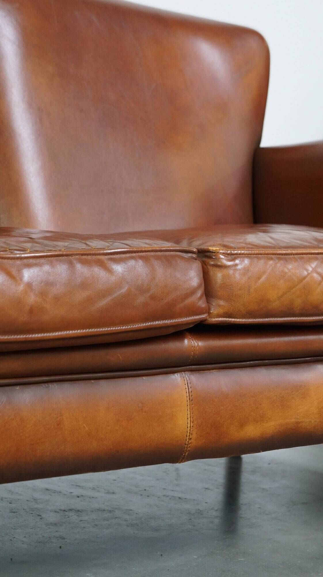 Classic 2 seater sheepskin sofa with beautiful colours and good seating comfort