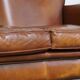 Classic 2 seater sheepskin sofa with beautiful colours and good seating comfort