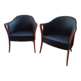 Pair of leather and wood armchairs in the Umberto Asnago style.