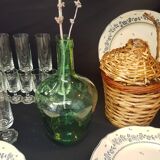 Small bottle style dame Jeanne and its wicker