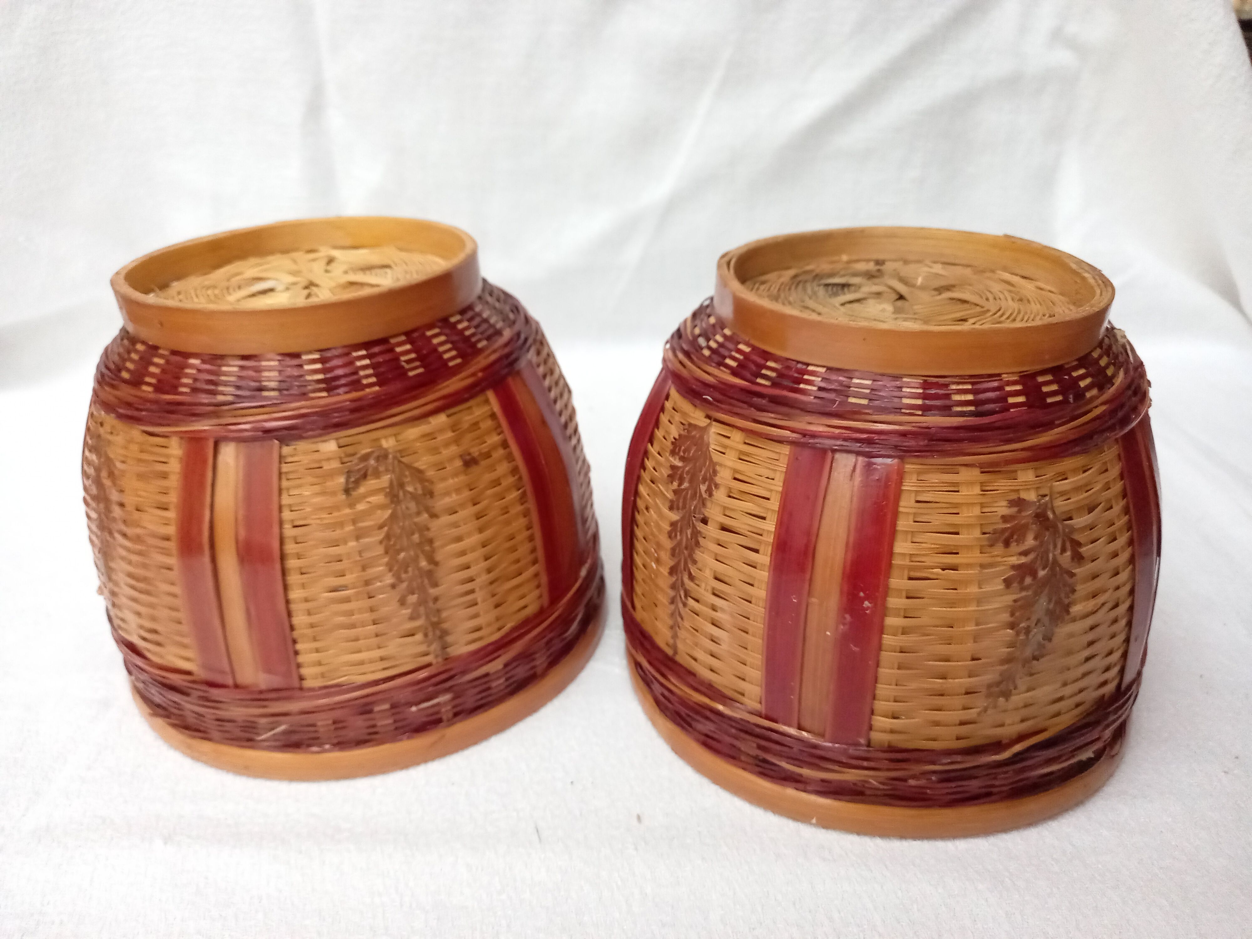 Duo of vintage braided wicker pot cover