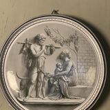 Glazed earthenware tondo in the antique style.