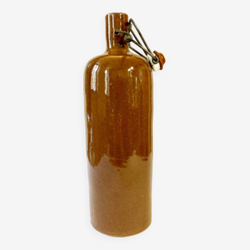 Bottle / hot water bottle in brown enamelled stoneware