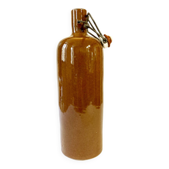 Bottle / hot water bottle in brown enamelled stoneware