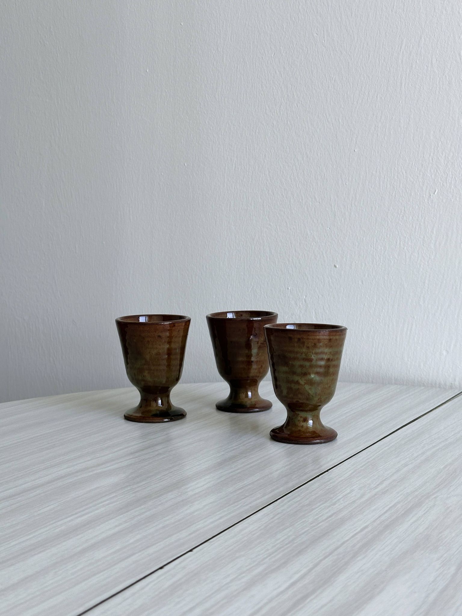 Set of 3 small enamelled ceramic mugs