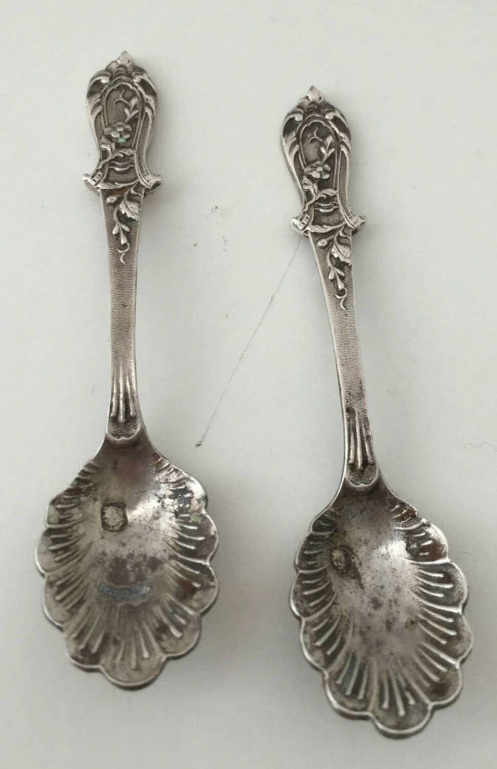 Beautiful pair of Louis XV style silver salt cellars