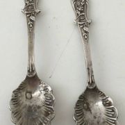 Beautiful pair of Louis XV style silver salt cellars