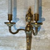 Set of 4 bronze wall lights in Louis XVI style.