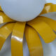 Applique soleil ancienne métal jaune et opaline