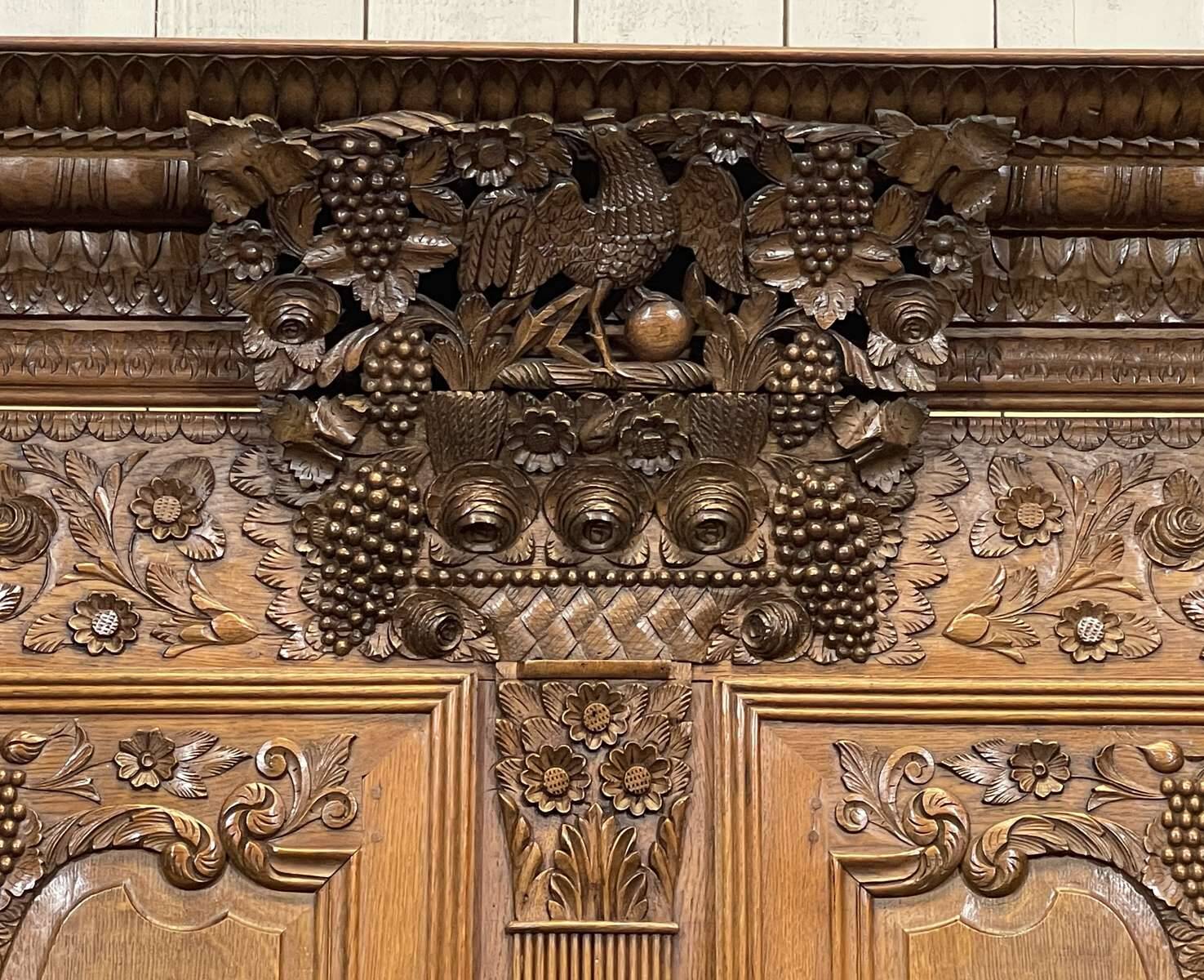 19th-century Norman wedding armoire in blonde oak.