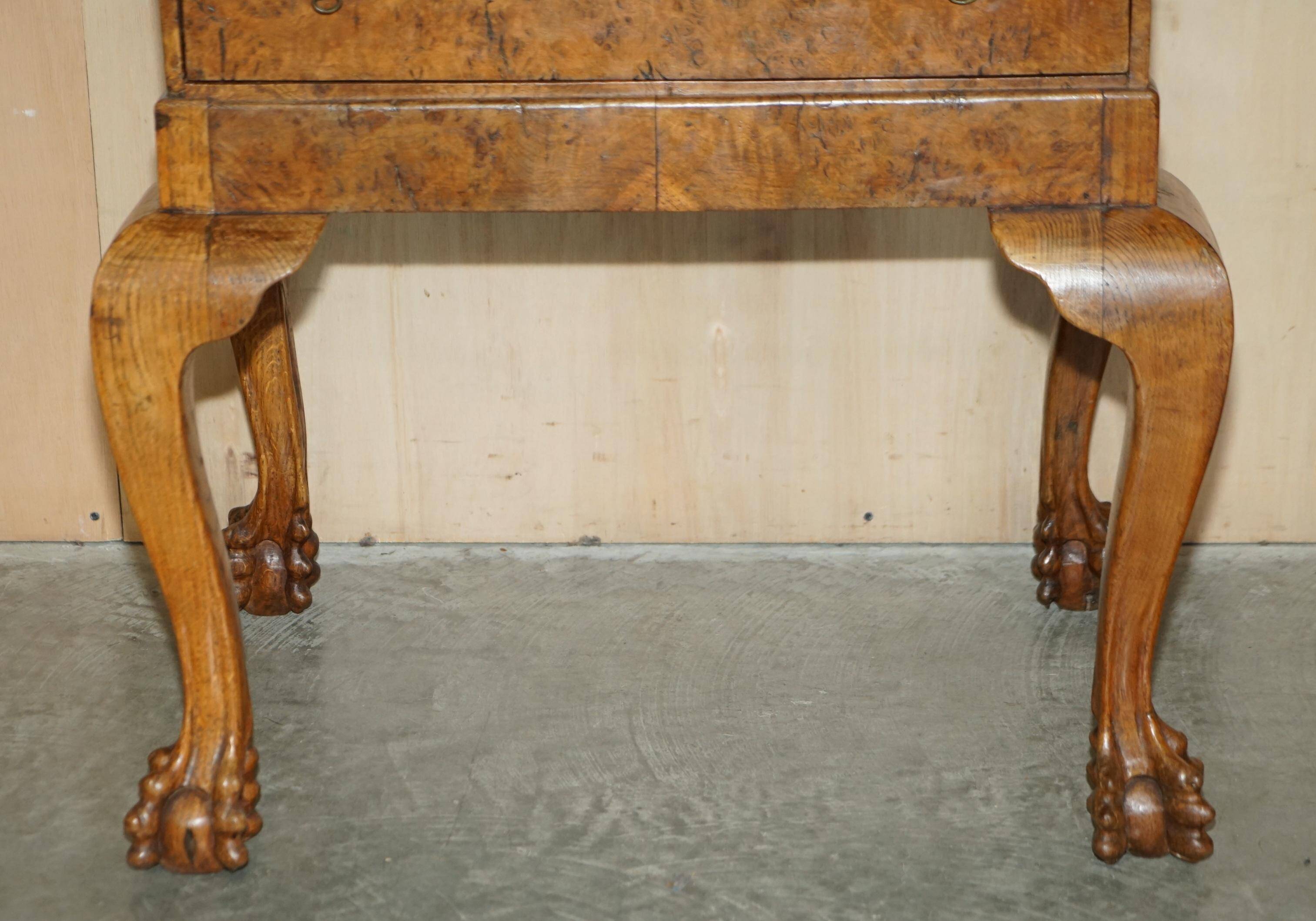 Writing desk in pollard oak from around 1800 with claw and ball carved legs.
