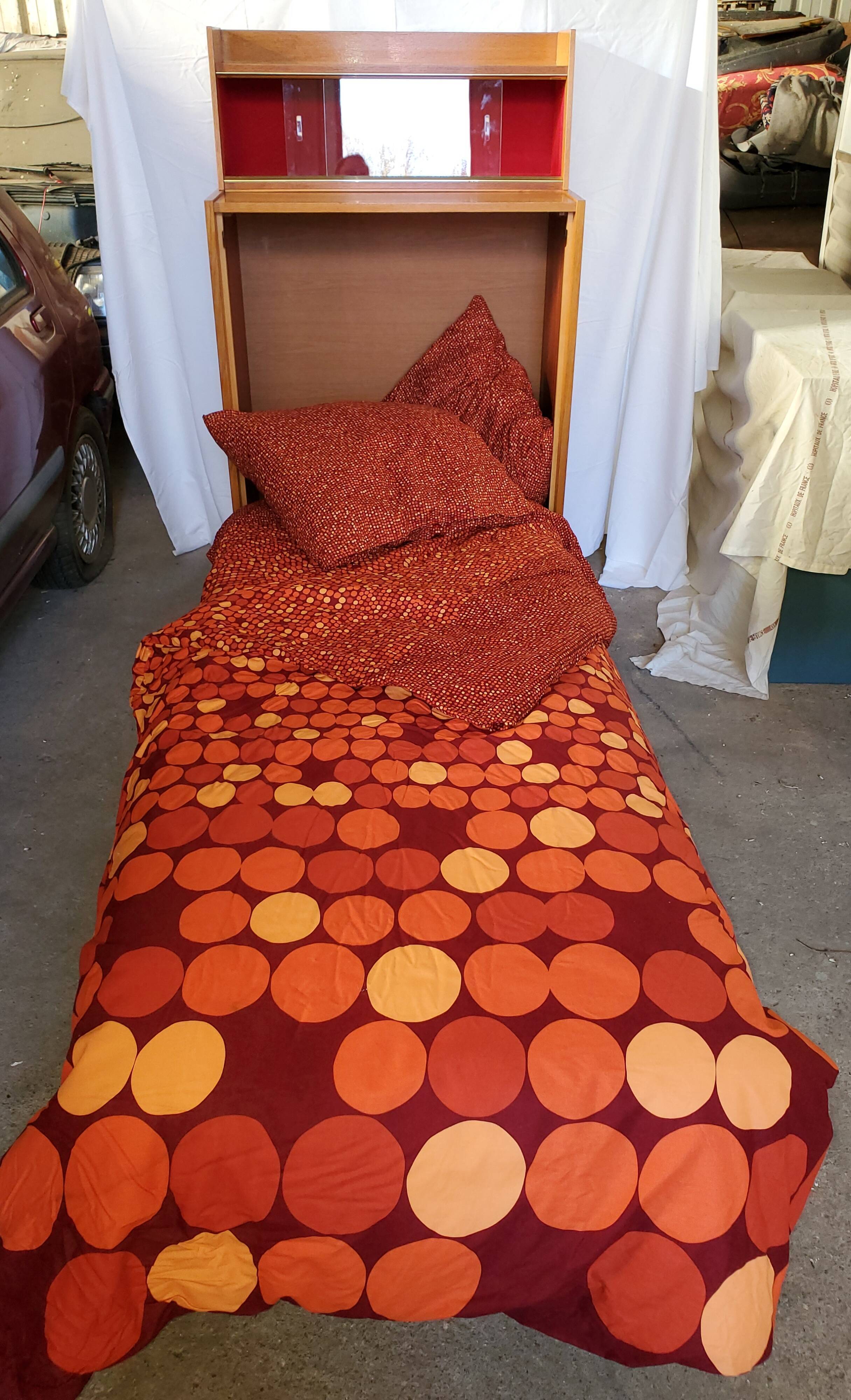 Fold bed in a 60's cabinet